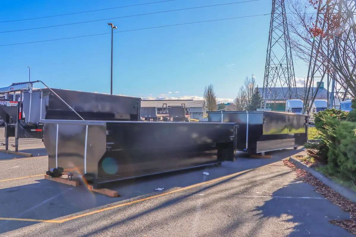 Roll-off dumpster ready for waste disposal at job site for 12 Yard Dumpster Rental in Brevard